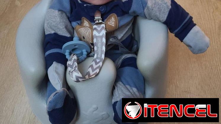 Bebé realista rasial con estravisdo