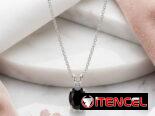 Juego de aretes cadenas y dijes