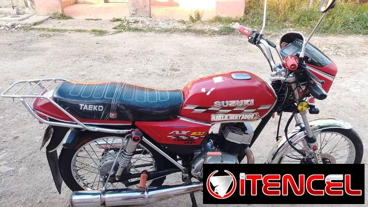 Se vende susuki ax100 con chapa y pacotillas al 100 todo listo para traspaso o poder