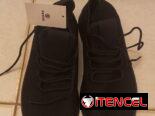 Tenis negros nuevos de engomados. Acepto mn y transferencia