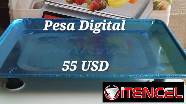 Pesas digitales nuevas en su caja