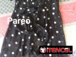 Ropa de mujer y tenis de hombre