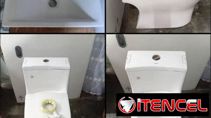 Lavamanos con muebles y tazas