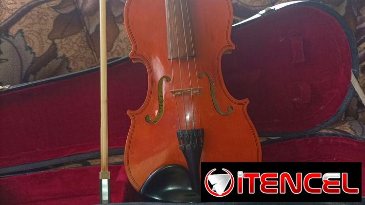 Vendo violin 3/4 con cuerdas de repuesto