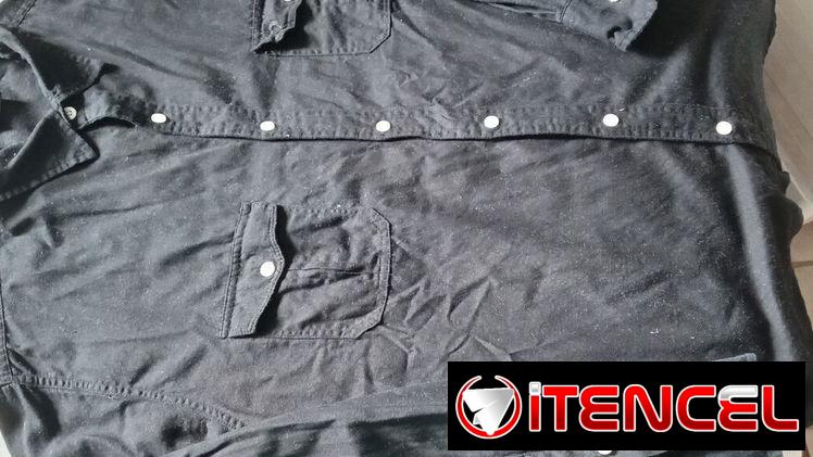 Camisa Hang Ten mangas largas talla XL. Negra botones blancos