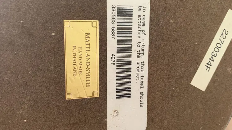 Estatuilla de bronce con base de mármol negro