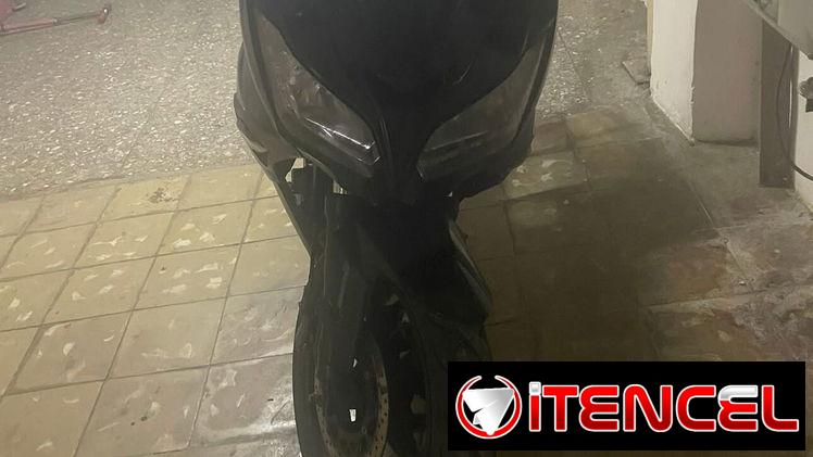 Vendo moto eléctrica racing batería michosuki haciendo 80 km por carga papeles en regla en  2500 usd interesados llamar