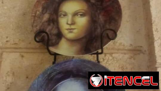 Adorno para pared platos con rostro