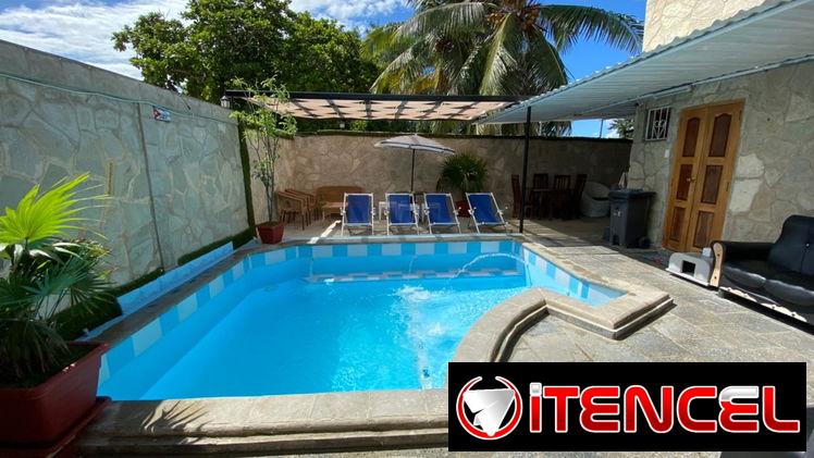 Casa Janet en renra de 3 habitaciones y piscina con sus paneles. Whatssap 5 2959440