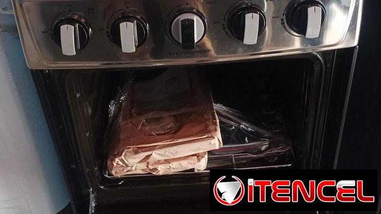 Vendo Cocina con horno, Premier, 4 hornillas, magneto, tapa de cristal -mensajería gratis