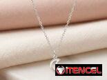 Juego de aretes cadenas y dijes