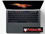 455 USD** — MacBook Pro + cargador + Magic Keyboard + Magic Mouse.