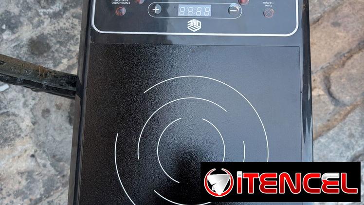 Vendo cosina de inducción con sus accesorios 56691051 20mil pesos