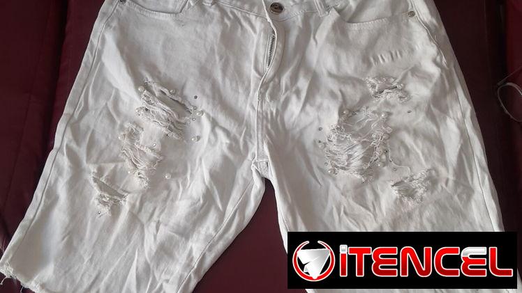 Short blanco talla 13 de mujer (poco uso en buen estado)