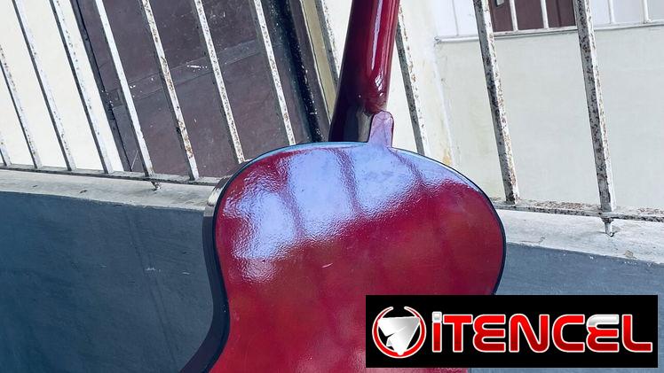 { Guitarra }