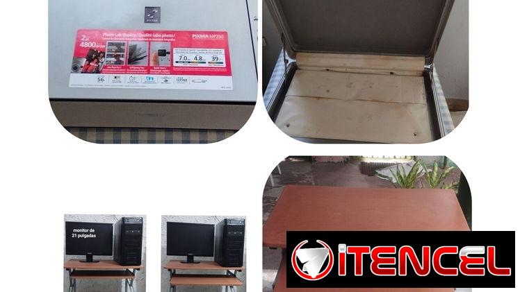 Impresora multifuncional Canon y mesa de computadora