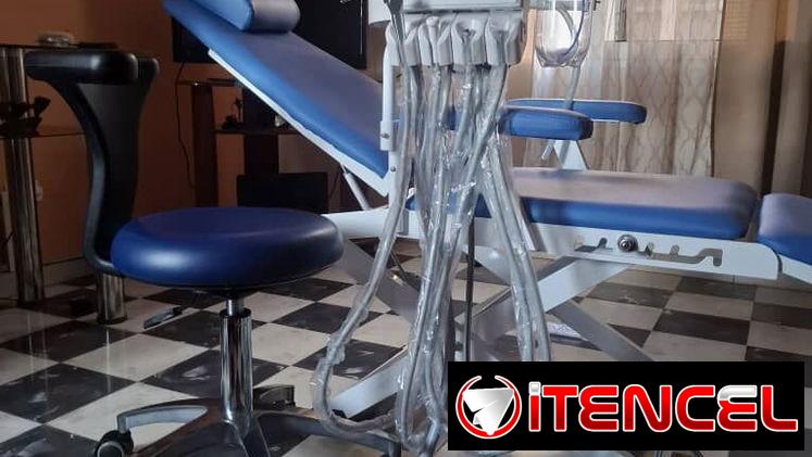. Sillón con unidad dental , silla giratoria y compresor.