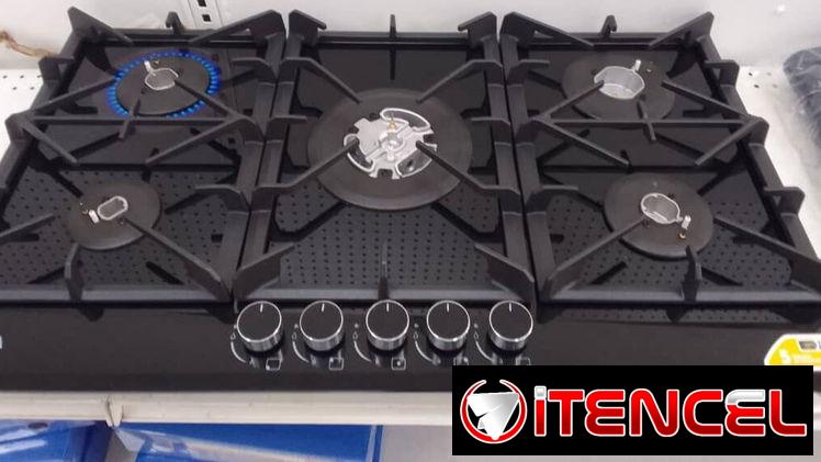 COCINA DE 5 HORNILLA DE CRISTAL TEMPLADO MARCA DRIJA CON SUS PAPELES Y GARANTIA