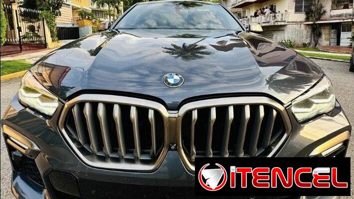 BMW X6 M50i 2022. V8 biturbo — foto 1