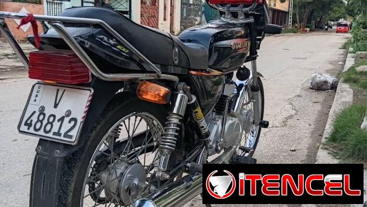 Suzuki AX-100 — foto 3