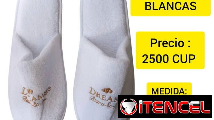 Se venden pantuflas blancas