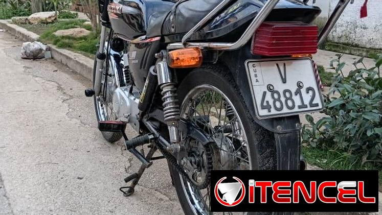 Suzuki AX-100 — foto 1