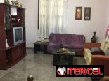 Permuta de apartamento en Vedado con garaje, bajos, 4 cuartos, tres baños, Terraza grande,