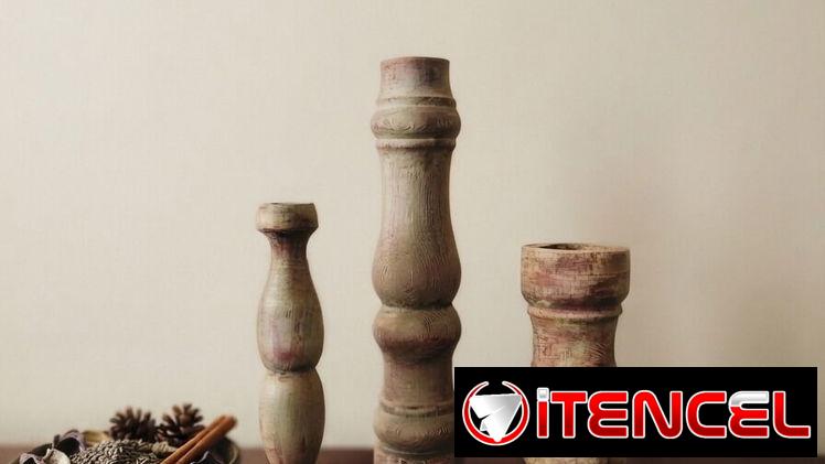 Candelabros de madera. Portavelas de madera.