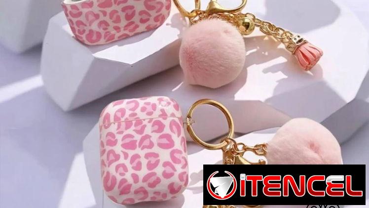 ☎️53544655 🛵 Entrega Disponible ⭐ Funda Rosa con Estampado de Leopardo para AirPods – Con Llavero de Pompón⭐ — foto 2